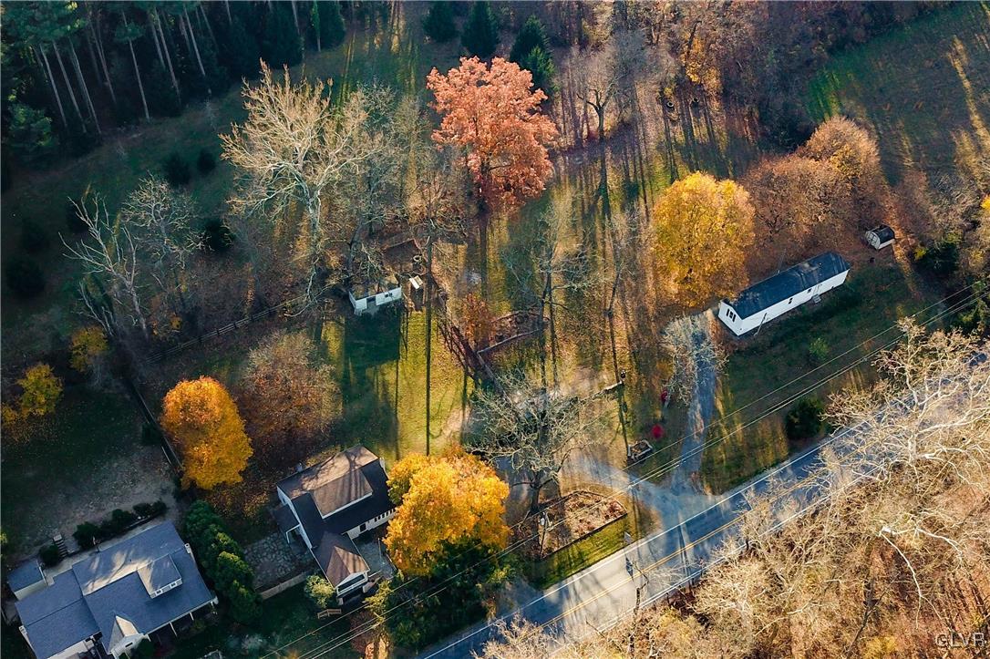 1802 Moselem Spring Road Hamburg, PA 19526 - Photo 2 of 54 an aerial view of a house with a yard and large trees