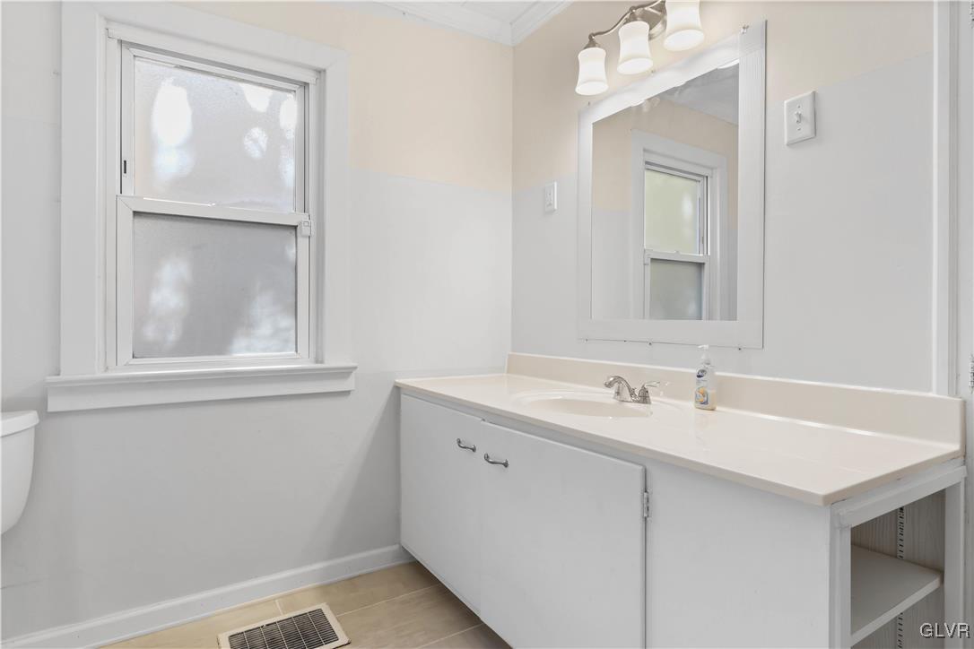 1802 Moselem Spring Road Hamburg, PA 19526 - Photo 24 of 54 a bathroom with a sink and a mirror