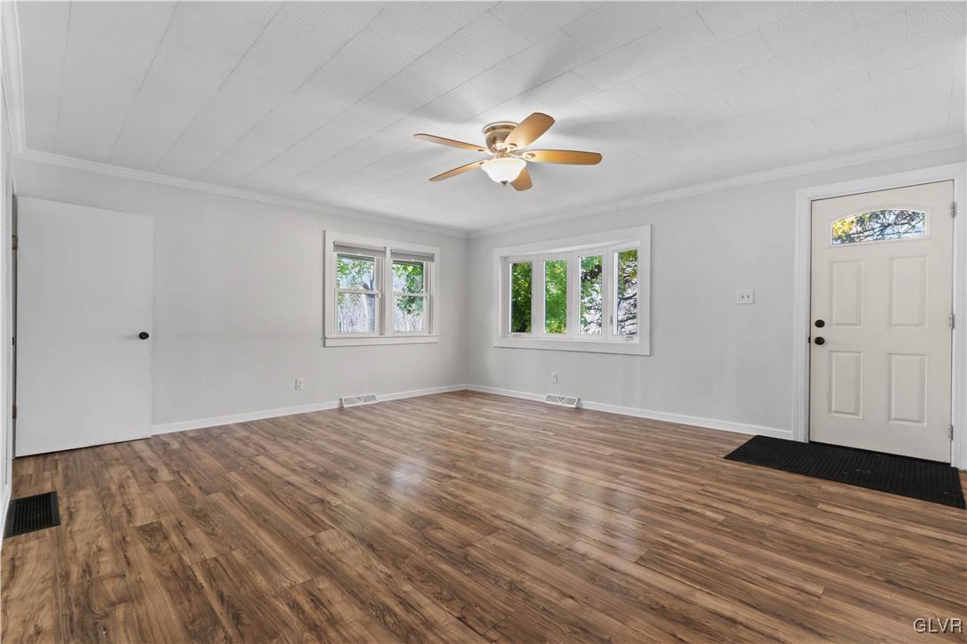 1802 Moselem Spring Road Hamburg, PA 19526 - Photo 10 of 54 a view of empty room with wooden floor and fan