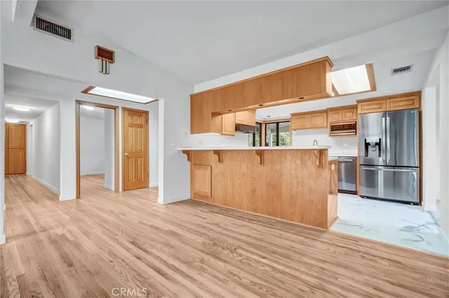 a bathroom with a sink a mirror and a bathtub