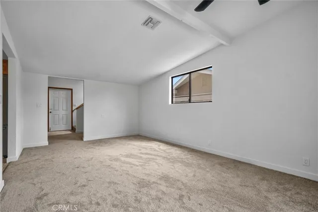 a view of entryway with wooden floor and stairs