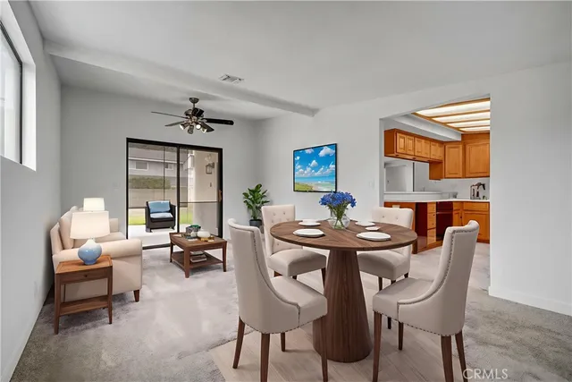 an empty room with windows and cabinet