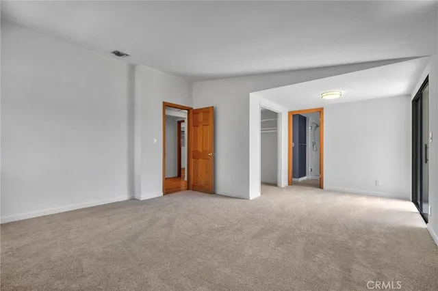 a view of the house with a yard