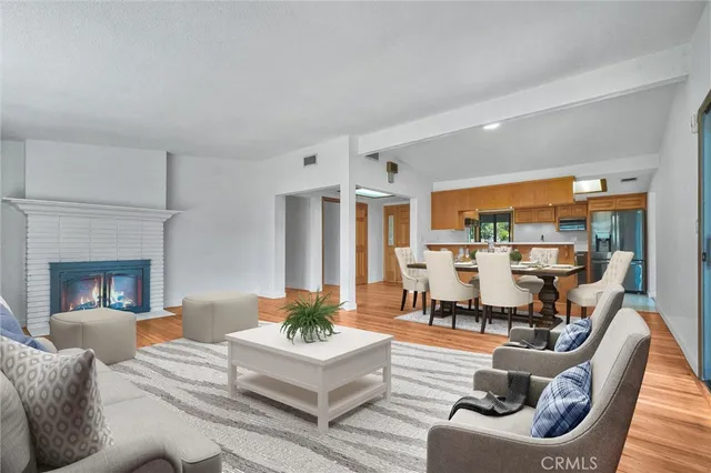 an empty room with windows and cabinet