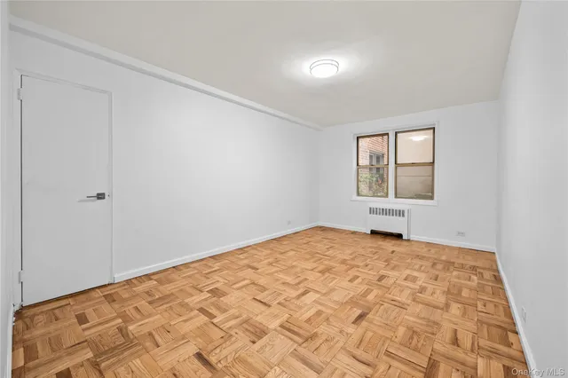 a view of an empty room and window