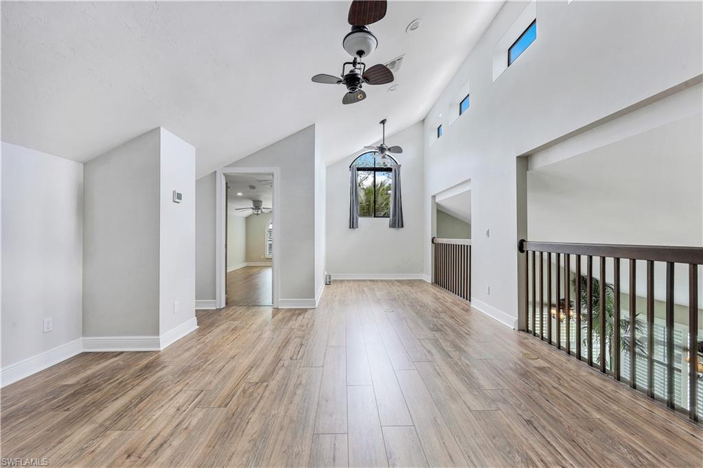 17680 Wildcat Drive Fort Myers, FL 33913 - Photo 22 of 50 wooden floor in an empty room with a window