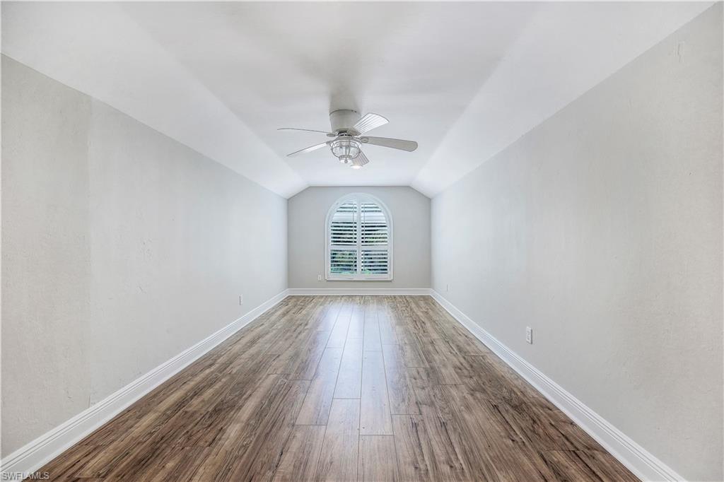 17680 Wildcat Drive Fort Myers, FL 33913 - Photo 24 of 50 wooden floor in an empty room with a window