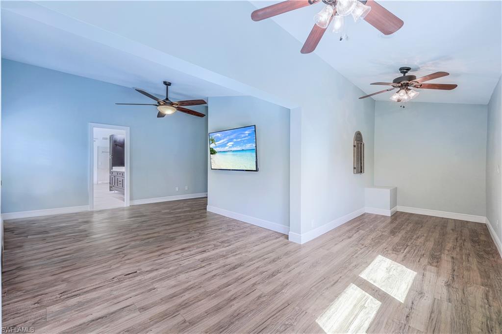 17680 Wildcat Drive Fort Myers, FL 33913 - Photo 30 of 50 wooden floor in an empty room with a window