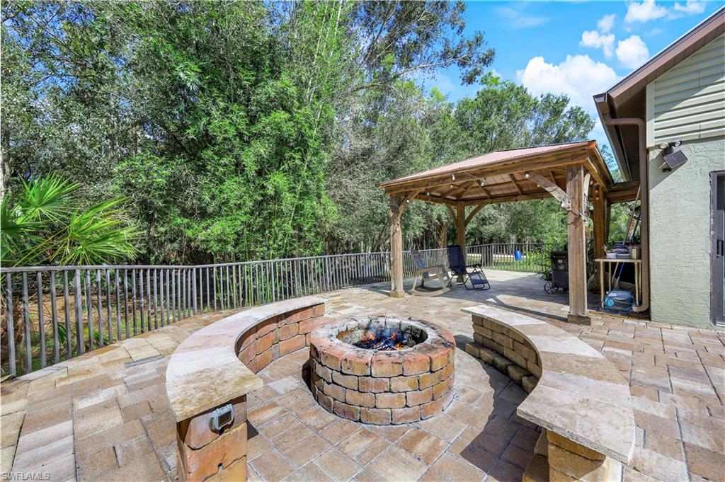 17680 Wildcat Drive Fort Myers, FL 33913 - Photo 36 of 50 a view of a swimming pool with a patio