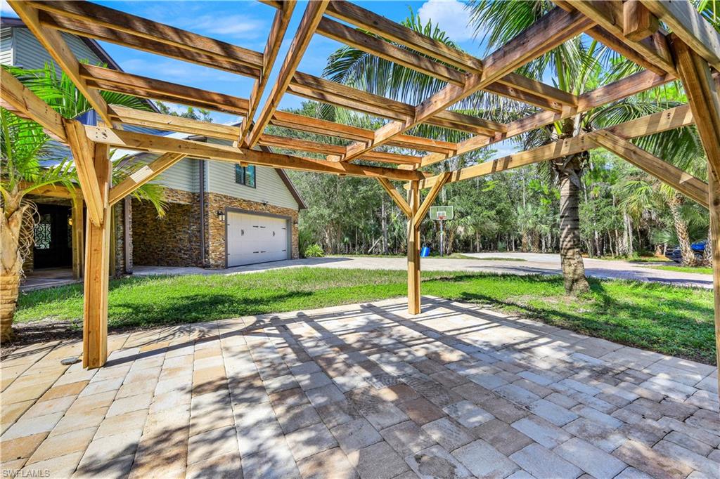 17680 Wildcat Drive Fort Myers, FL 33913 - Photo 41 of 50 a view of a house with a yard