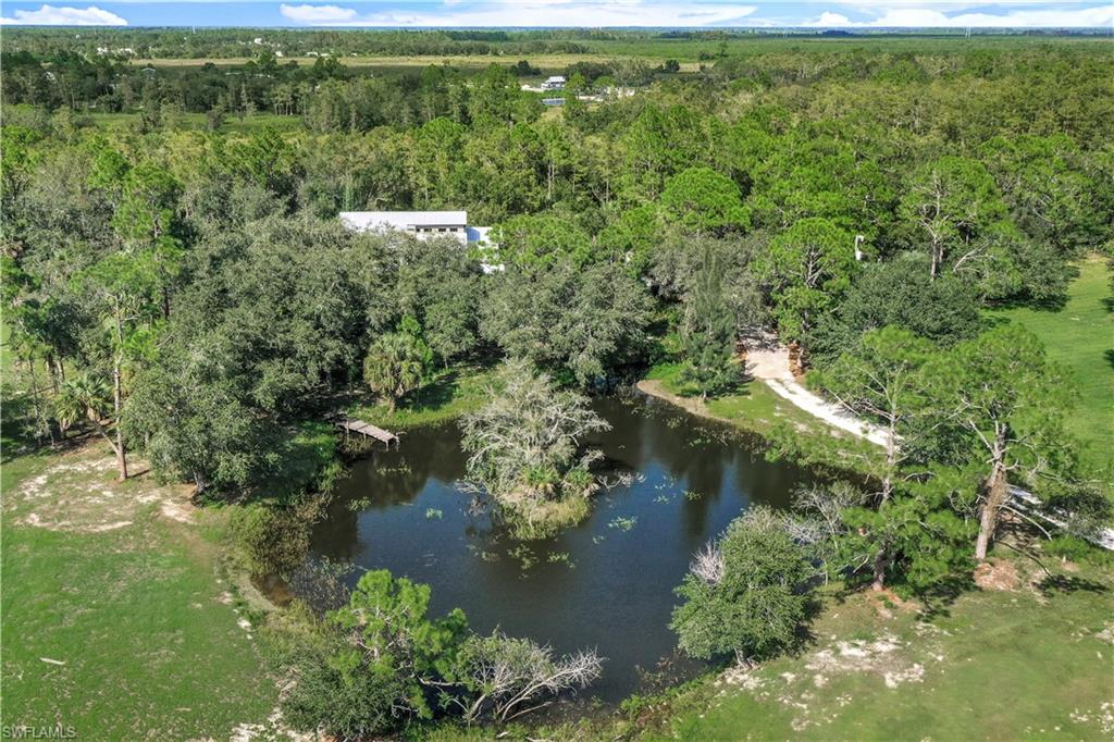 17680 Wildcat Drive Fort Myers, FL 33913 - Photo 50 of 50 a view of a lake with a house