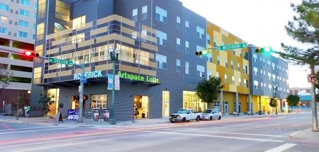 a view of a building on a street