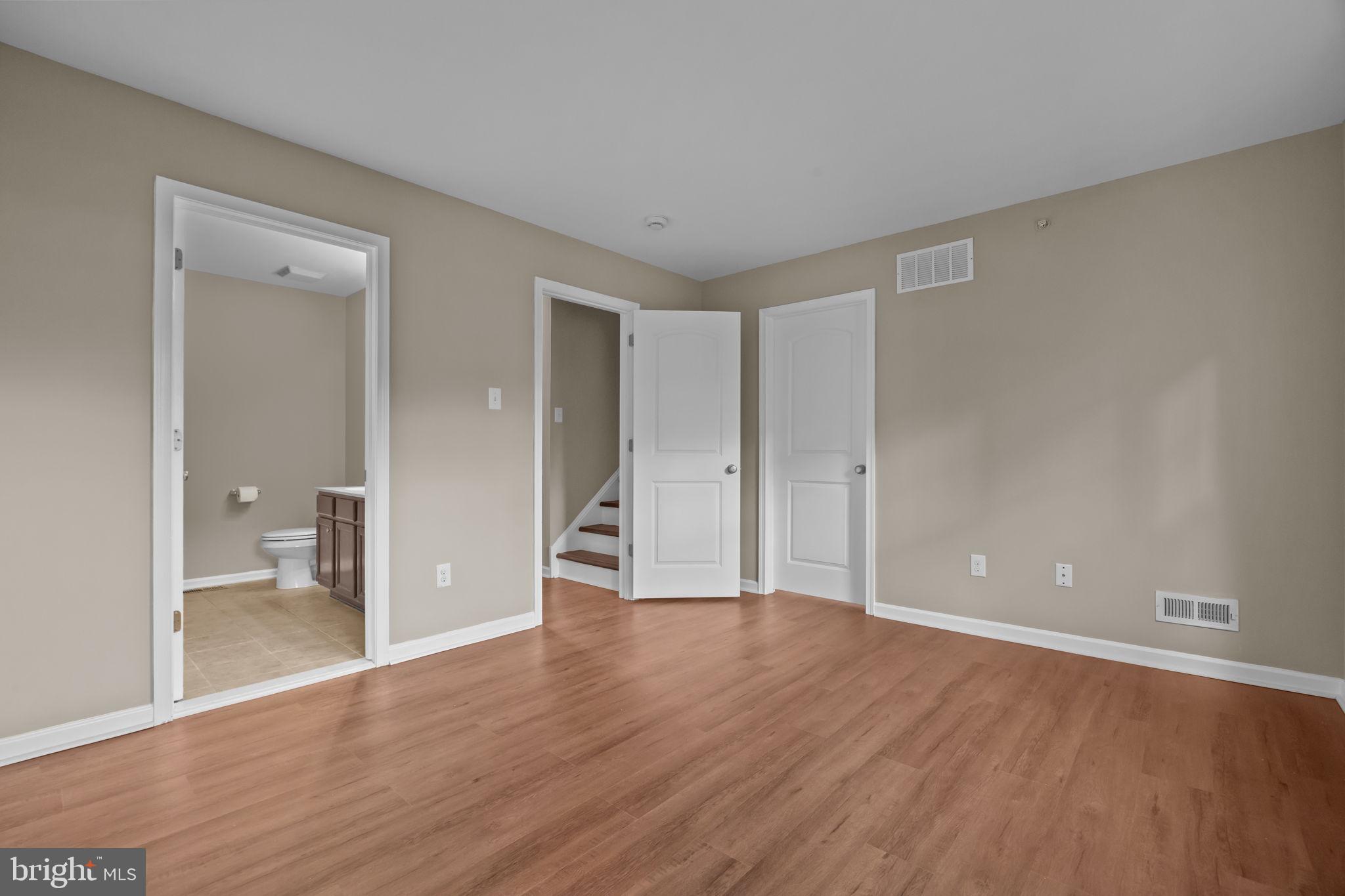 3880 Cephas Child Road, Unit 11 Doylestown, PA 18902 - Photo 16 of 34 wooden floor in an empty room