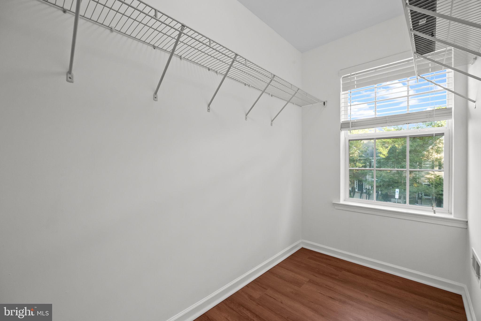 3880 Cephas Child Road, Unit 11 Doylestown, PA 18902 - Photo 18 of 34 a view of a room with wooden floor and windows