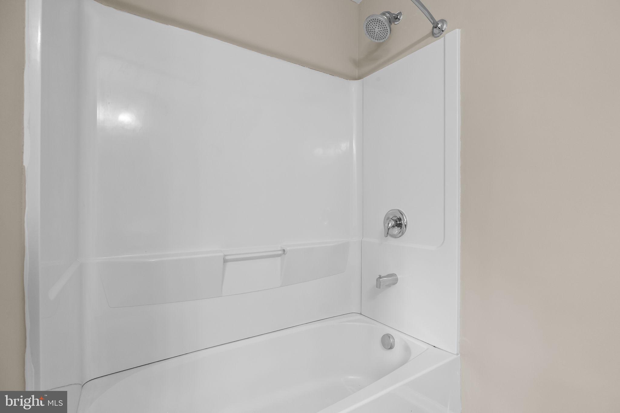 3880 Cephas Child Road, Unit 11 Doylestown, PA 18902 - Photo 23 of 34 a bathroom with a bathtub