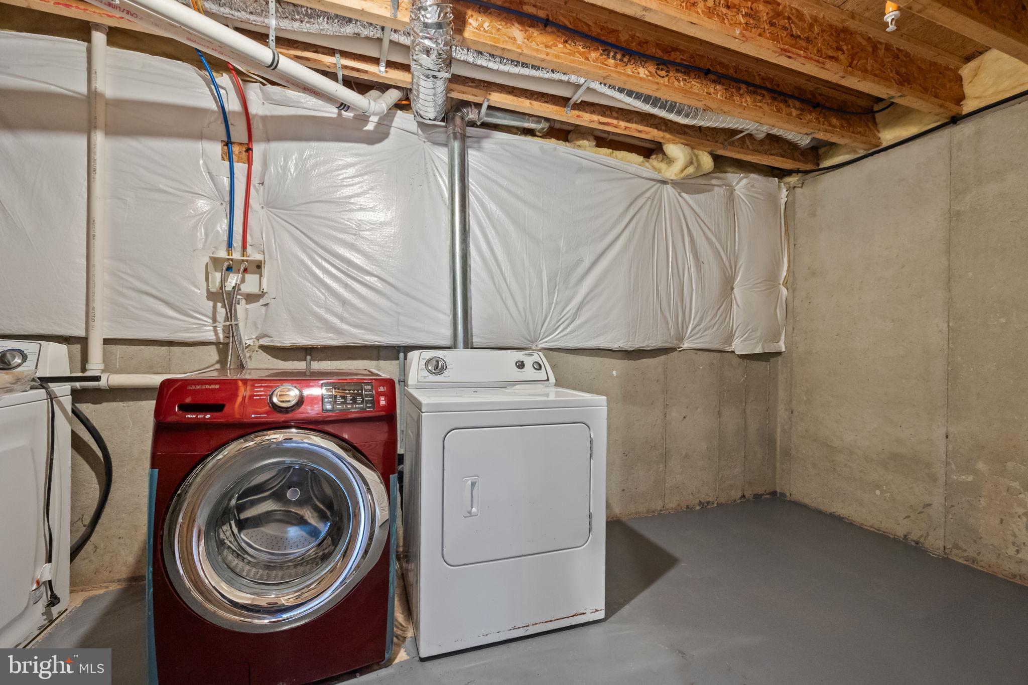 3880 Cephas Child Road, Unit 11 Doylestown, PA 18902 - Photo 33 of 34 a utility room with dryer and washer