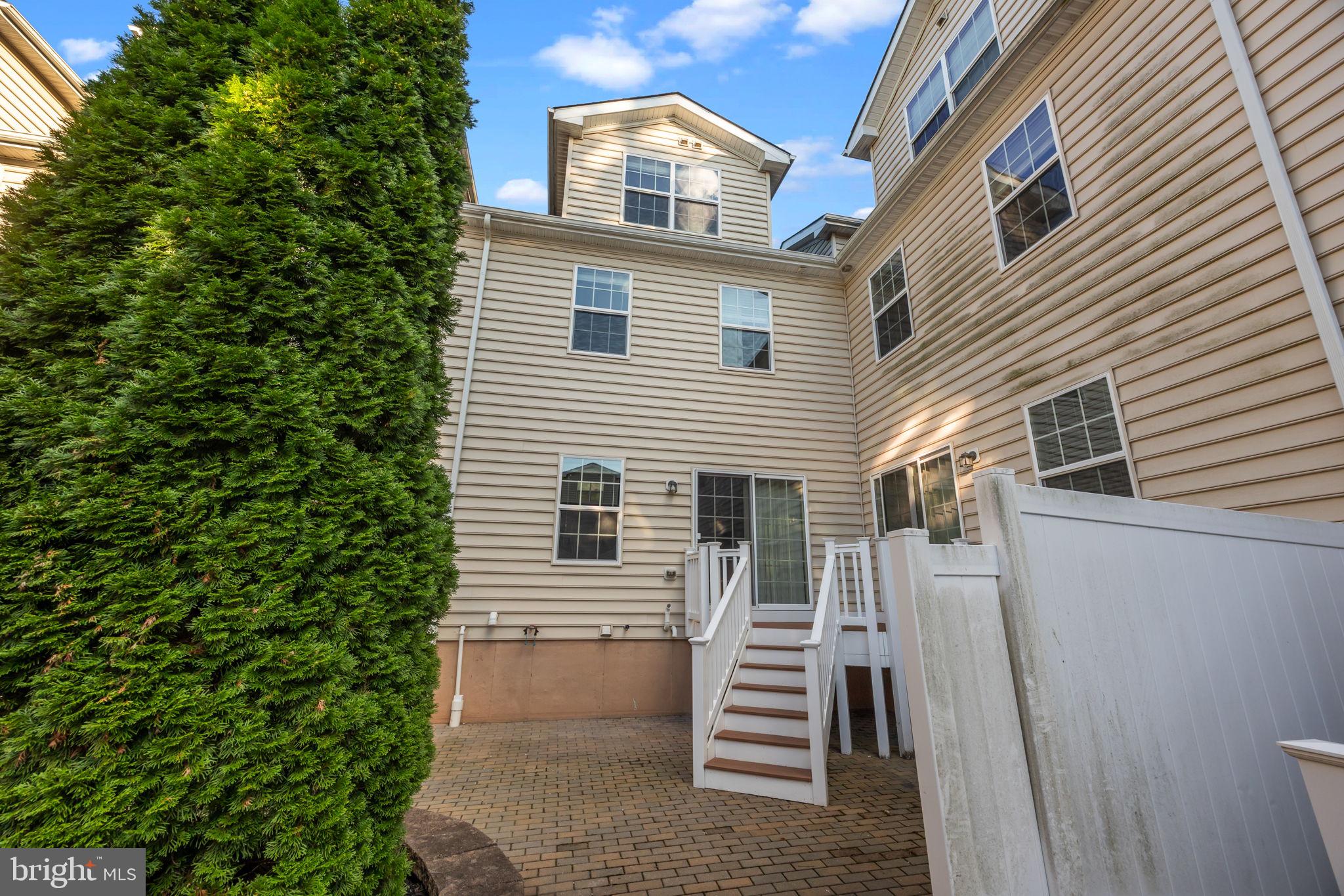 3880 Cephas Child Road, Unit 11 Doylestown, PA 18902 - Photo 34 of 34 a view of a house with a yard