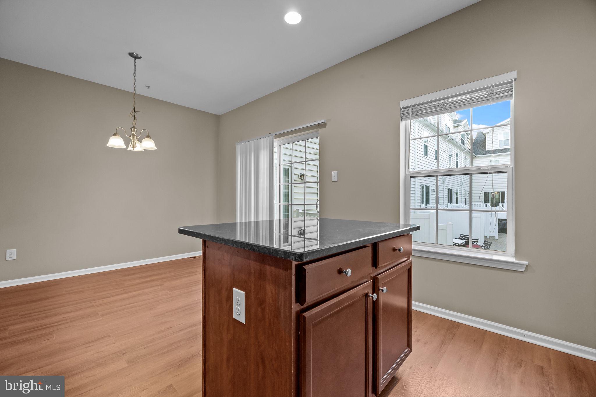 3880 Cephas Child Road, Unit 11 Doylestown, PA 18902 - Photo 8 of 34 a room with wooden floor and window