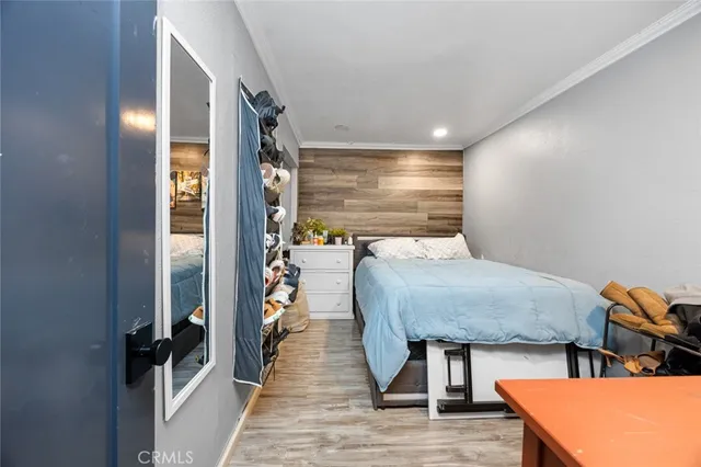 a room with furniture and wooden floor