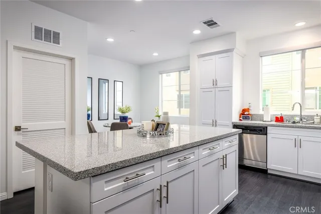 a bedroom with a bed and a closet