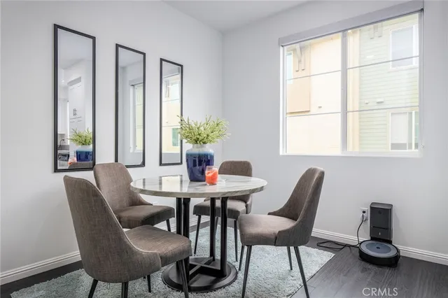 a bathroom with a sink vanity and mirror