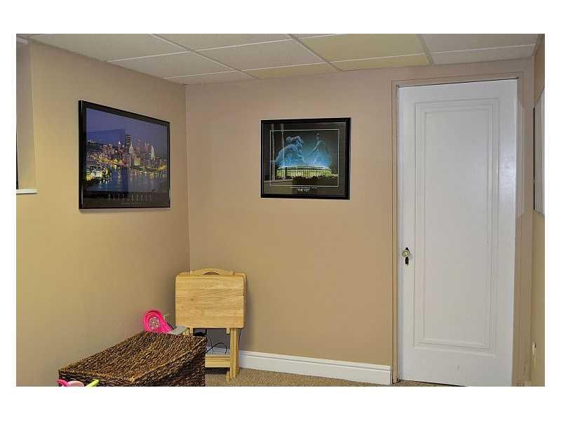 357 Goldsmith Road Pittsburgh, PA 15237 - Photo 20 of 25 Family Room. Entry to laundry room through this door of the family room.