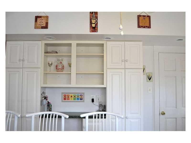 357 Goldsmith Road Pittsburgh, PA 15237 - Photo 8 of 25 Kitchen. Here there is a double pantry, recessed lighting, decorative shelving and additional counter space. The door leads to the lower level.
