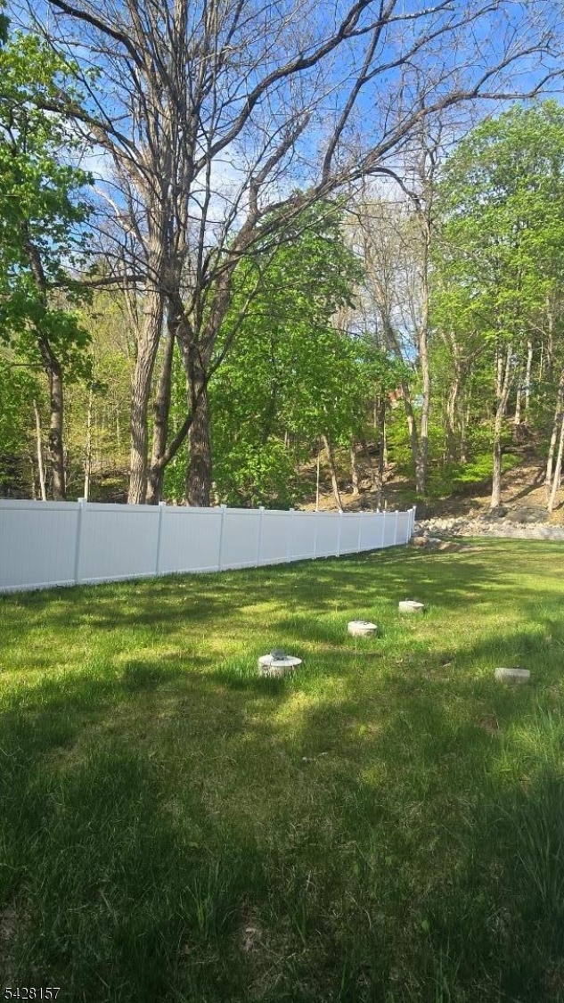 2 Ashley Court Butler, NJ 07405 - Photo 3 of 8 a view of yard with swimming pool and green space