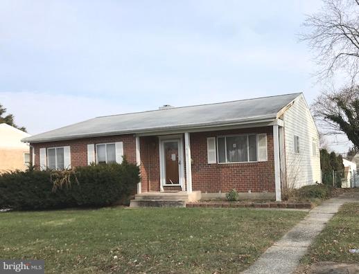 1419 Hallwood Road Baltimore, MD 21228 - Photo 1 of 14 a front view of a house with garden