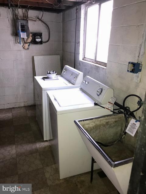1419 Hallwood Road Baltimore, MD 21228 - Photo 11 of 14 a utility room with dryer and washer