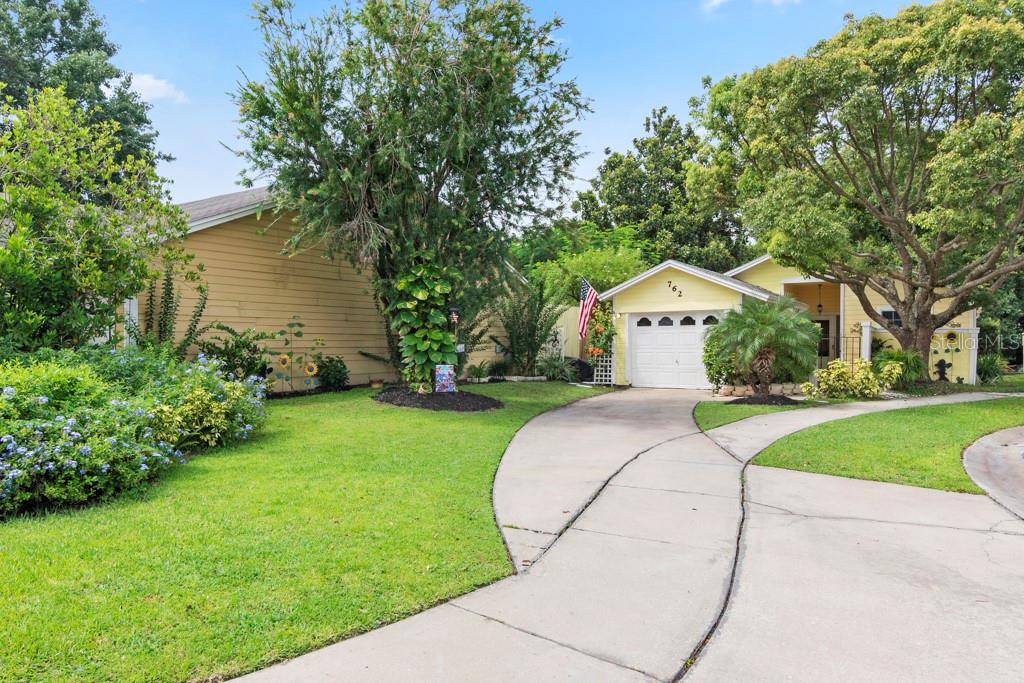 a house view with a garden space