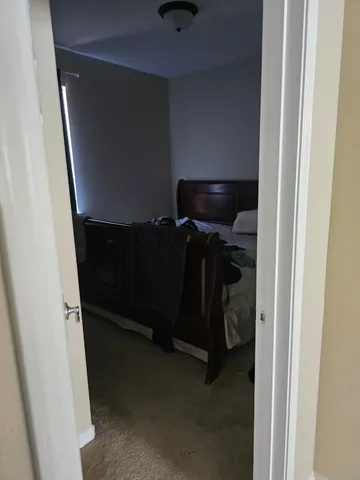 a view of hallway with closet
