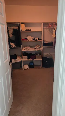 a room with mirror and sink