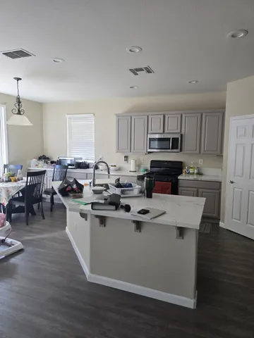 a view of a car parked in front of a house