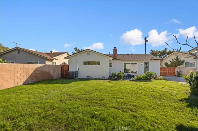 a house view with a garden space