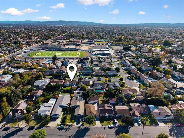a view of a city with mountains in the background