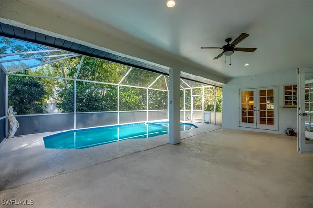 a view of empty room with floor to ceiling window