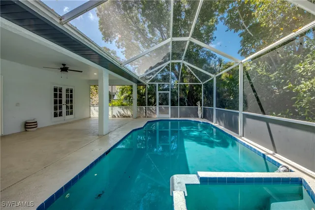 a view of a backyard with a small deck