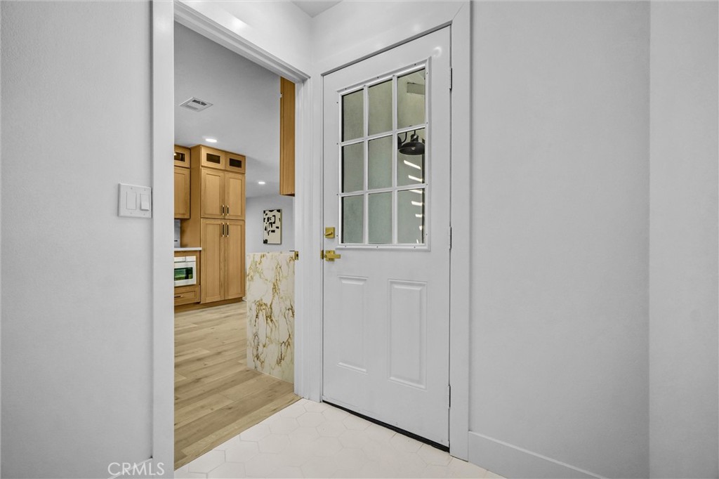 6032 Vane Circle Huntington Beach, CA 92647 - Photo 18 of 56 an empty room with windows