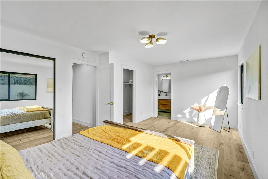 6032 Vane Circle Huntington Beach, CA 92647 - Photo 24 of 56 a bedroom with a bed and a couch