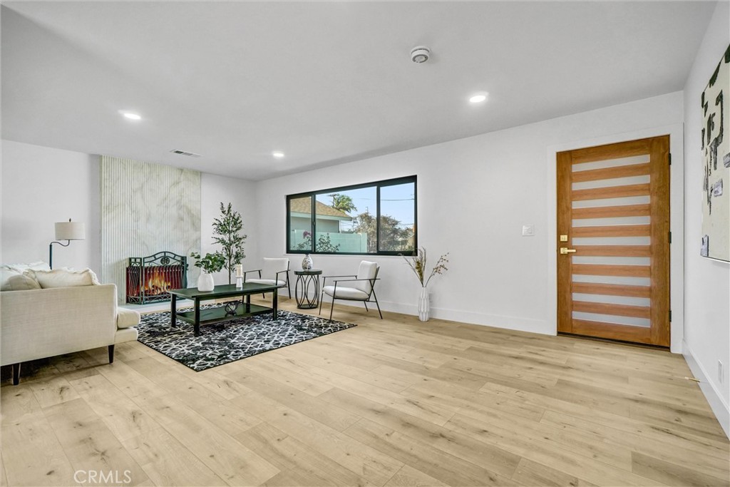 6032 Vane Circle Huntington Beach, CA 92647 - Photo 9 of 56 a living room with furniture and a window