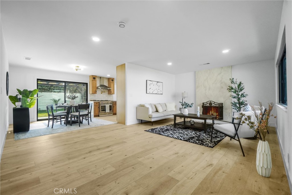 6032 Vane Circle Huntington Beach, CA 92647 - Photo 10 of 56 a living room with furniture and a table with kitchen view