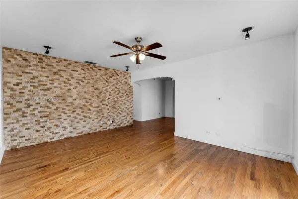 a view of workspace with wooden floor