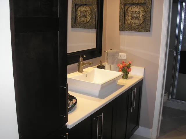 a bathroom with a sink and a mirror