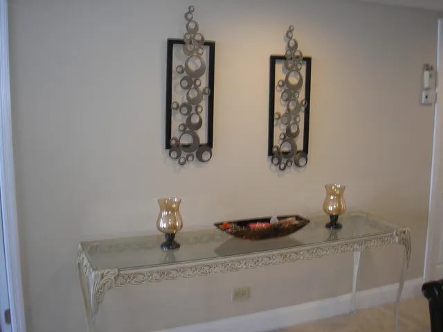a bathroom with a sink and vanity