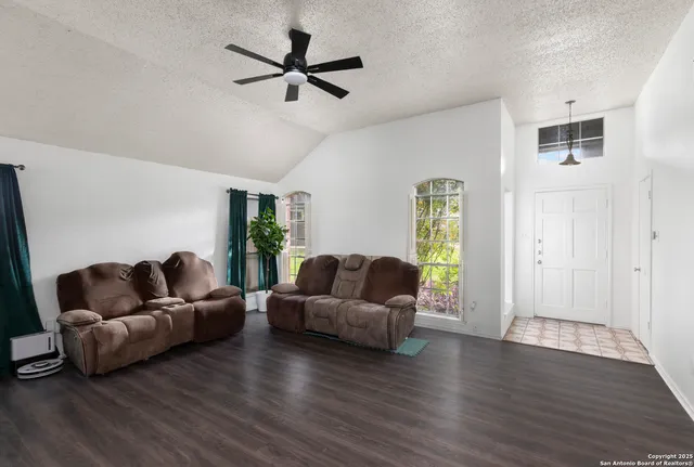 a view of a hallway with a white walls