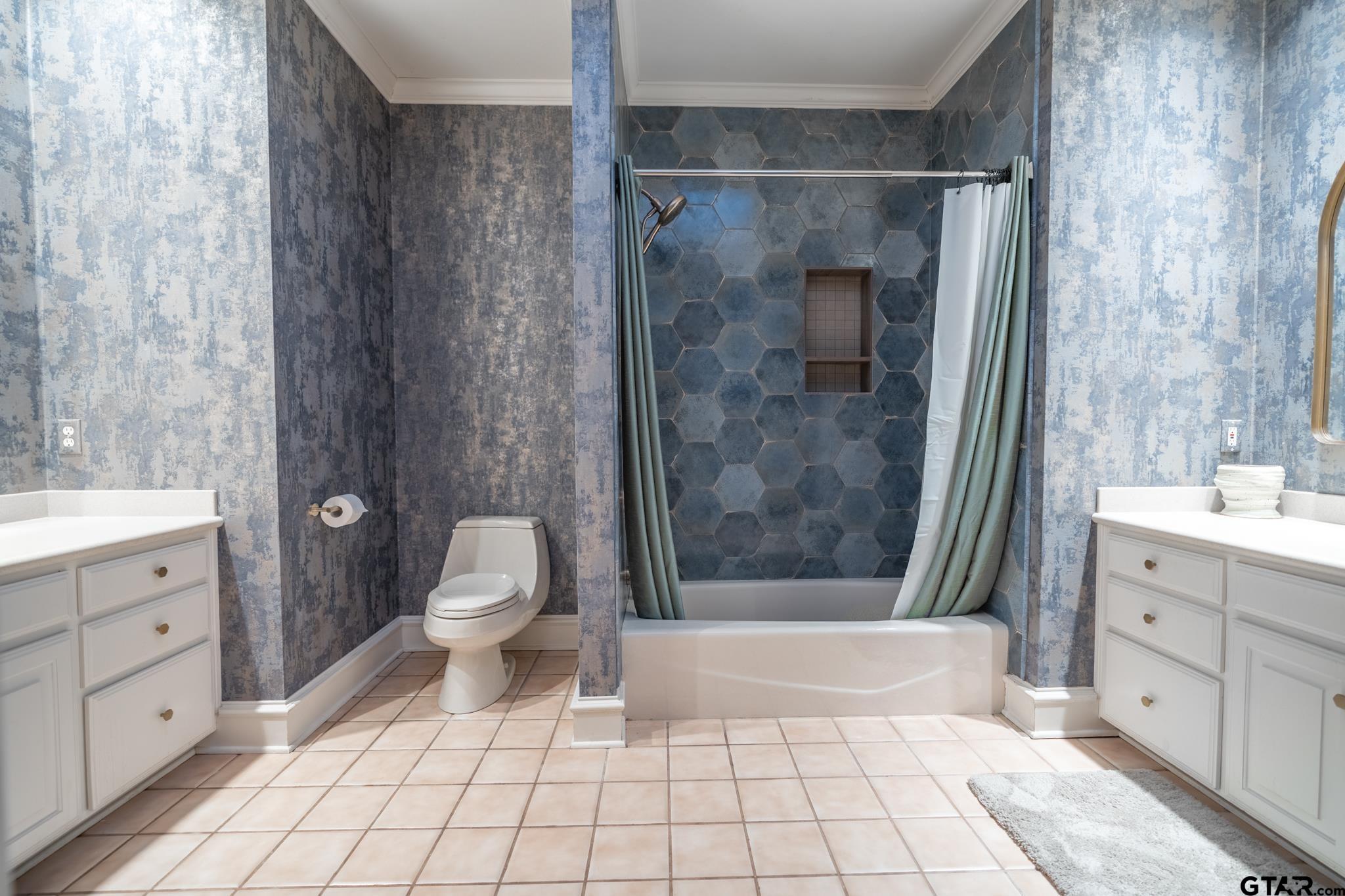 1520 Clubview Drive Tyler, TX 75701 - Photo 37 of 48 a bathroom with a sink toilet and shower