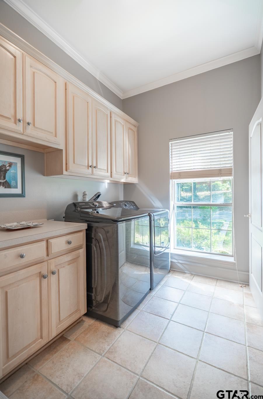 1520 Clubview Drive Tyler, TX 75701 - Photo 39 of 48 a kitchen with stainless steel appliances granite countertop a stove a sink and white cabinets