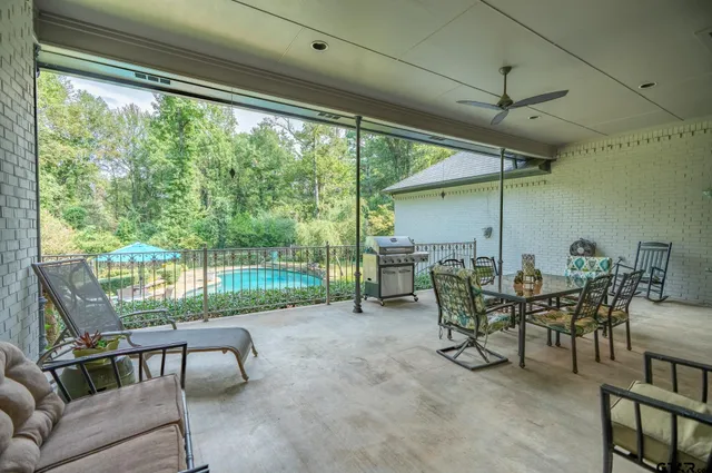 a view of a dining room with furniture window and outside view