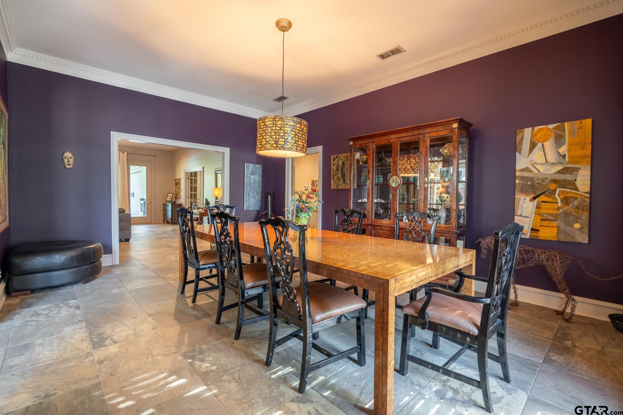 1520 Clubview Drive Tyler, TX 75701 - Photo 8 of 48 a dining room with furniture a chandelier and window